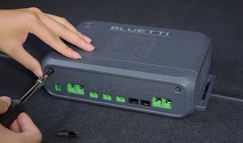 Unscrew and remove the cover from Charger 2