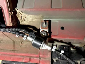 Fuel pump installed with custom hanger to reduce vibrations
